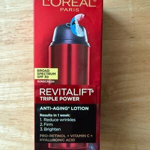 L'Oreal Revitalift Triple Power Anti-Aging Lotion - Red and Black